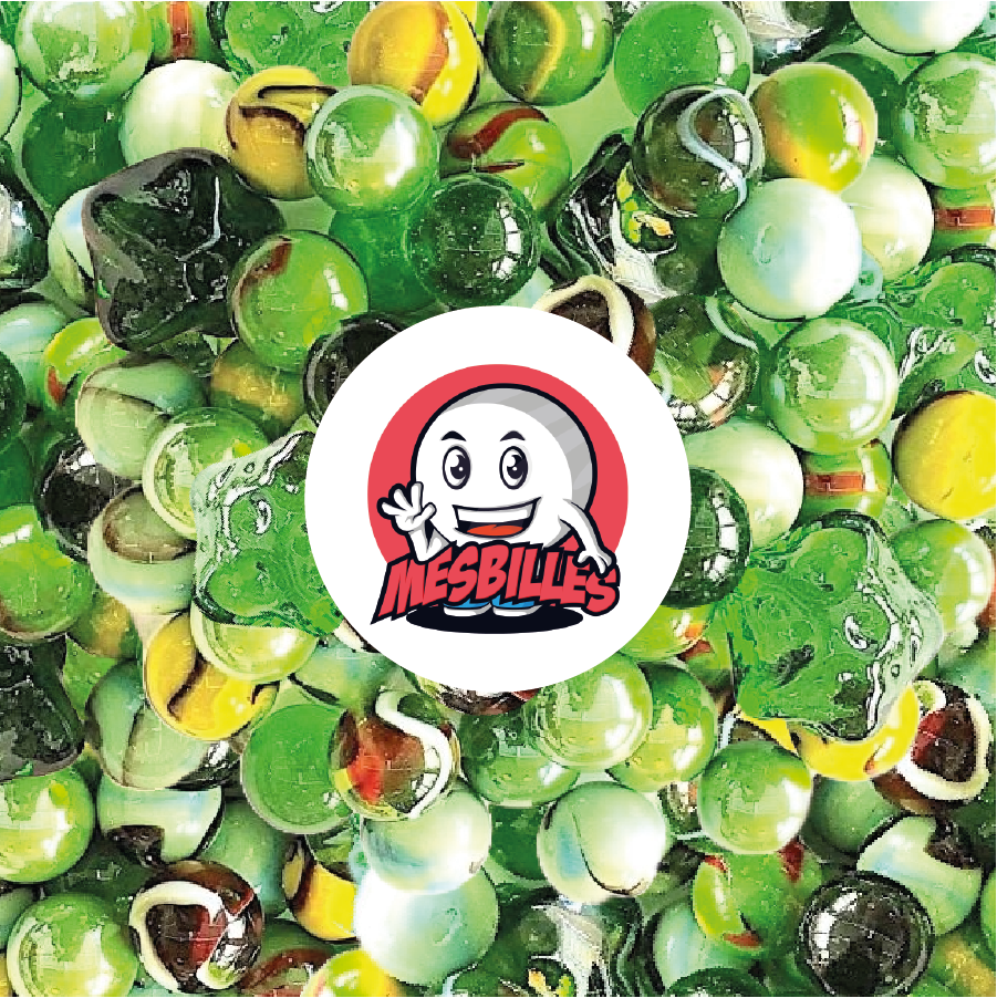 Collection de billes MesBilles aux tons verts, jaunes et bruns, rappelant les couleurs d’un jardin fleuri et lumineux