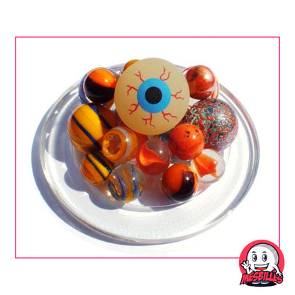 Collection MesBilles Halloween : assortiment orange, noir et rouge avec une bille œil effrayante au centre