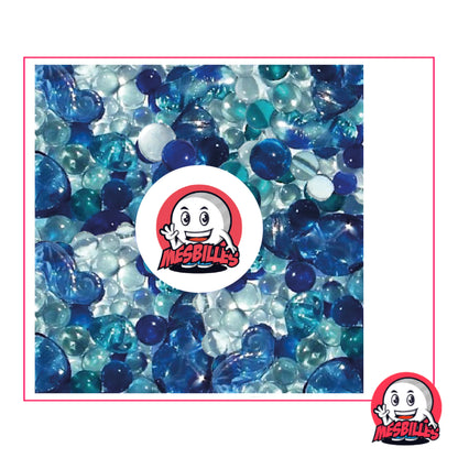 Ensemble MesBilles Marine : billes bleues, turquoise et blanches aux reflets cristallins rappelant l’océan et ses profondeurs