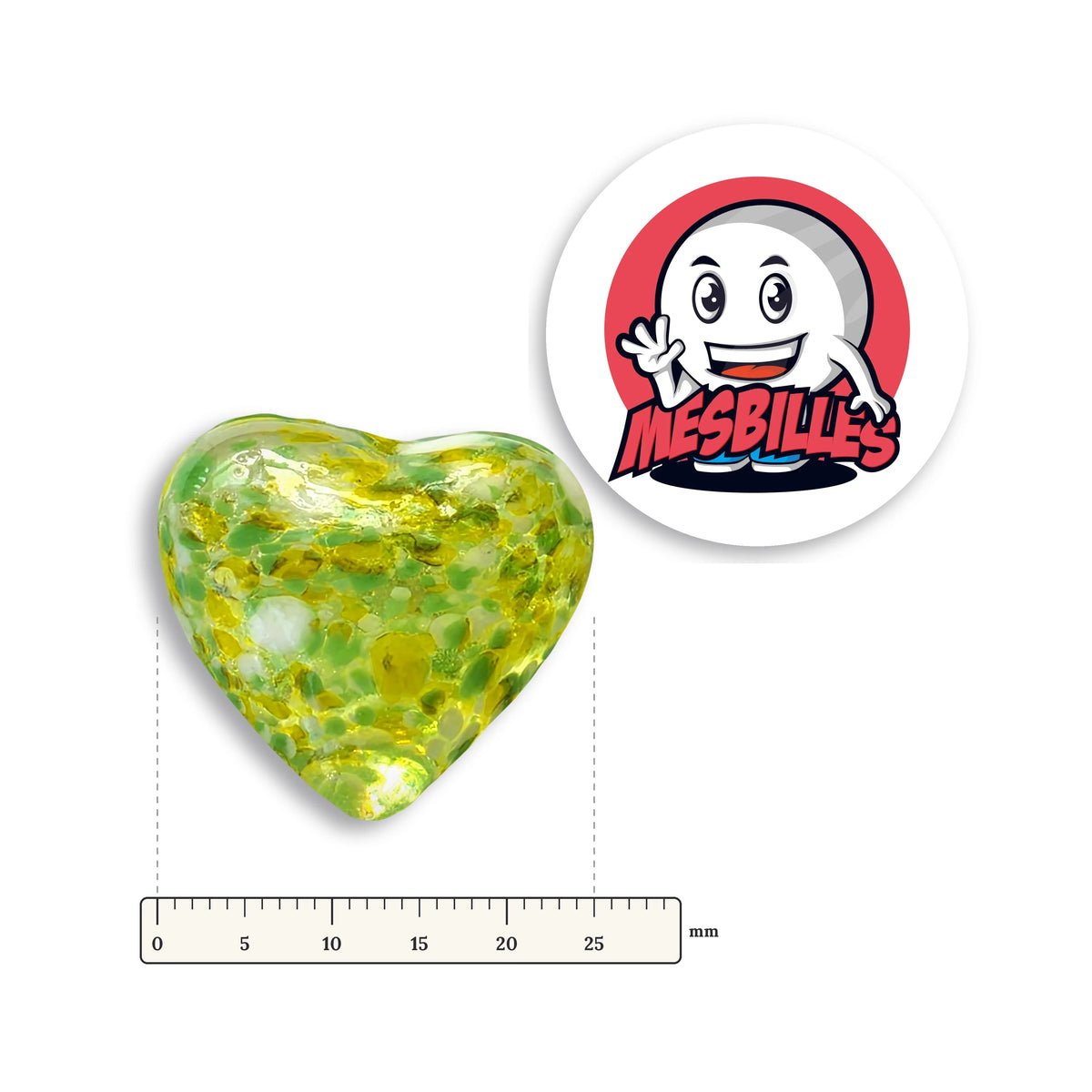 Bille Coeur Cristal Mouchetée Vert et Blanc à côté d'une règle graduée, environ 25 mm de large