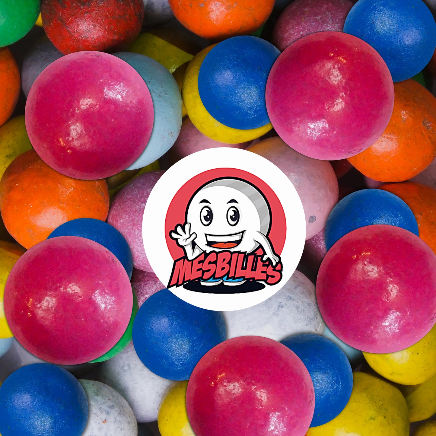 Collection de billes en terre multicolores avec plusieurs billes rose 16 mm au premier plan, ambiance ludique et colorée